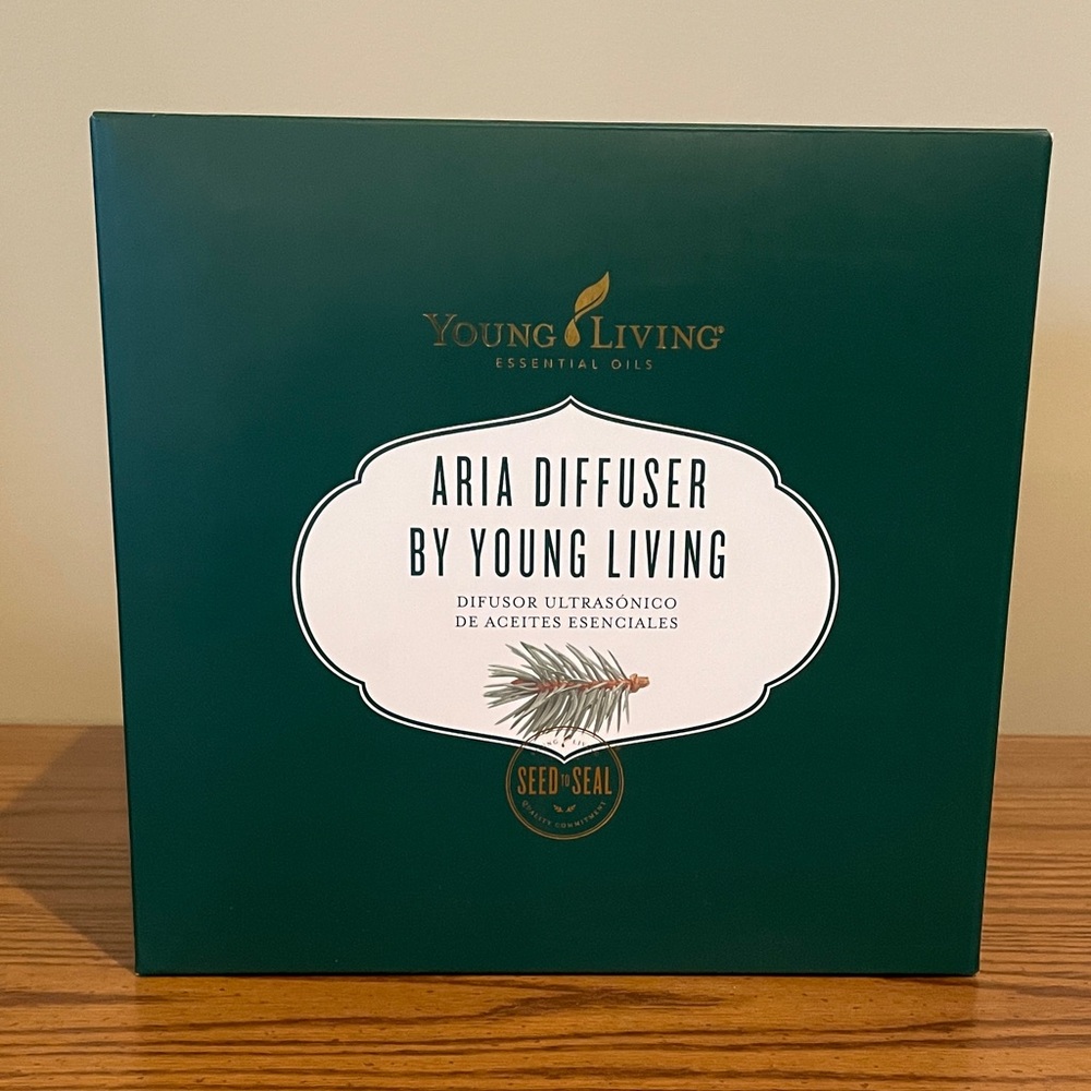 Young Living Aria ultrasonic diffuser new in box never taken out.